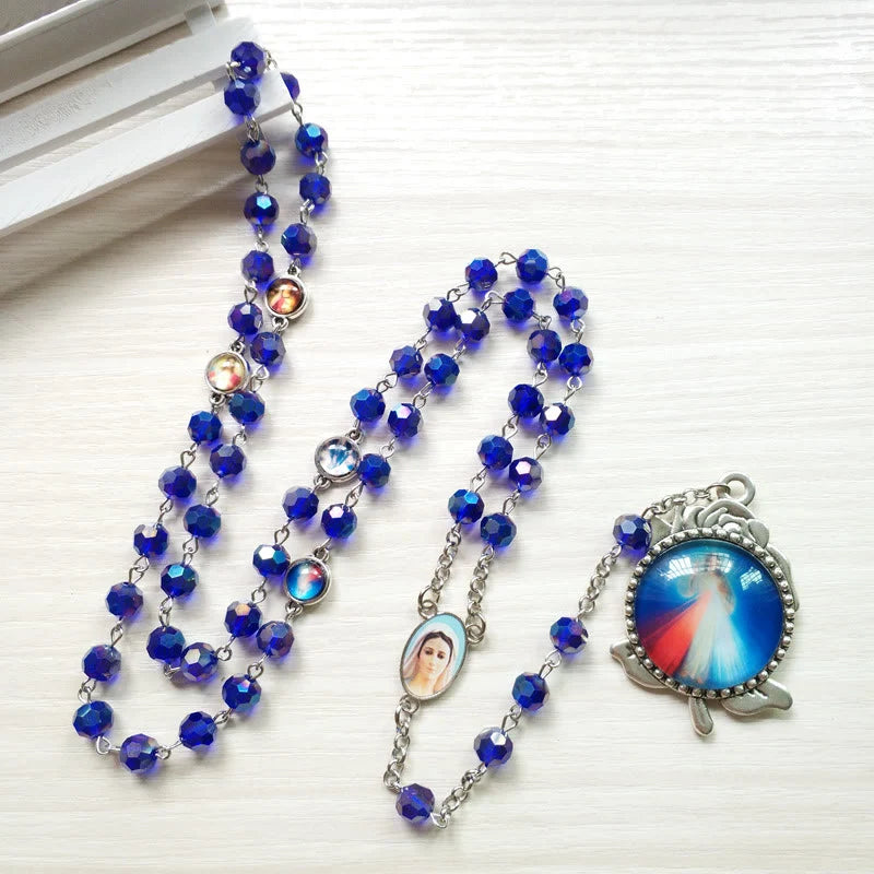 Rosario con catenella in lega e grani di cristallo blu, sfaccettati, Madonna di Fatima e Sacro Cuore di Gesù, 6 mm