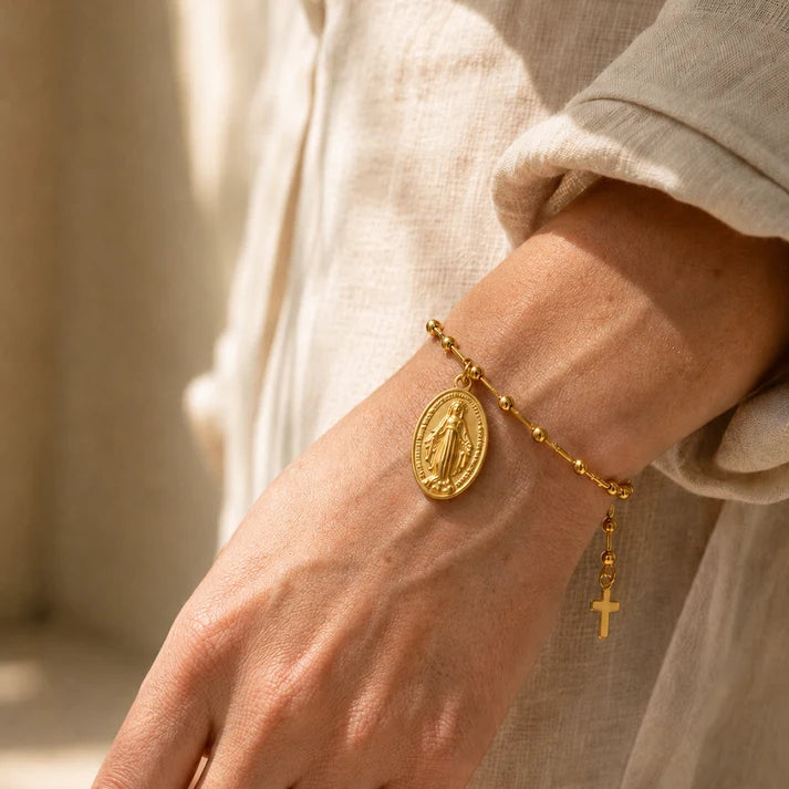 Bracciale religioso in oro