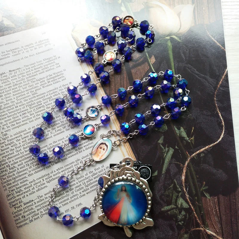 Rosario con catenella in lega e grani di cristallo blu, sfaccettati, Madonna di Fatima e Sacro Cuore di Gesù, 6 mm