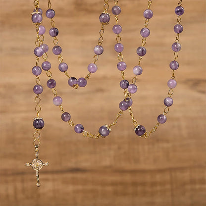 Rosario con cristallo rotondo viola dal diametro di 8 mm con immagine della Madonna di Guadalupe e crocifisso