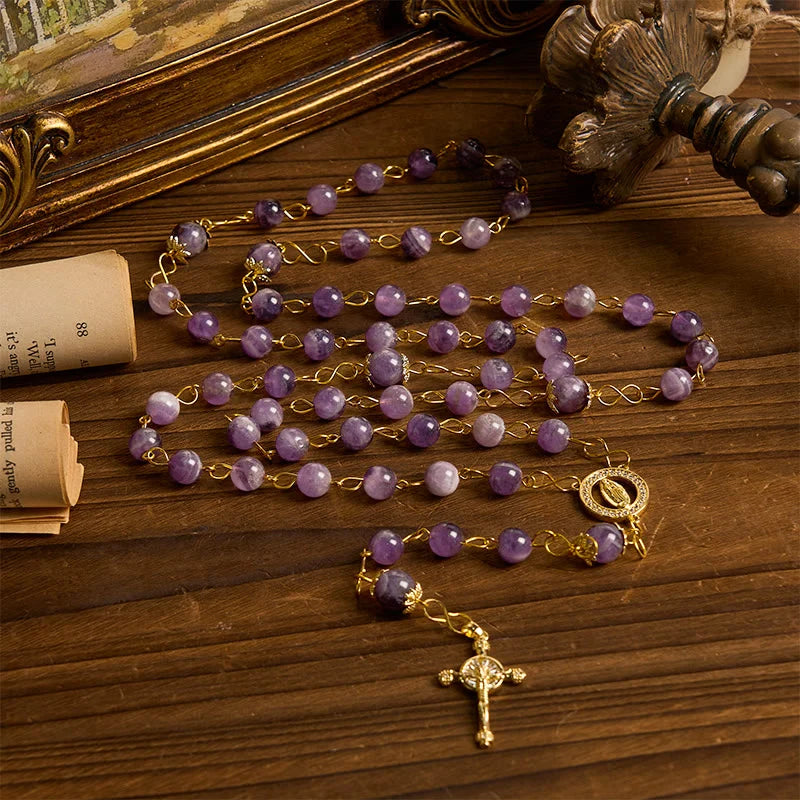Rosario con cristallo rotondo viola dal diametro di 8 mm con immagine della Madonna di Guadalupe e crocifisso