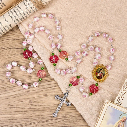 Medaglietta di Santa Teresa e crocifisso in rosa e avorio da 8 mm, rosario dall'eleganza floreale – scopri la grazia e la bellezza della fede