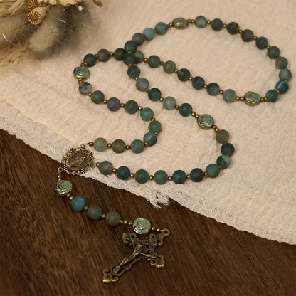 agata verde con accenti di rosa marrone: un sacro viaggio di guarigione e fede