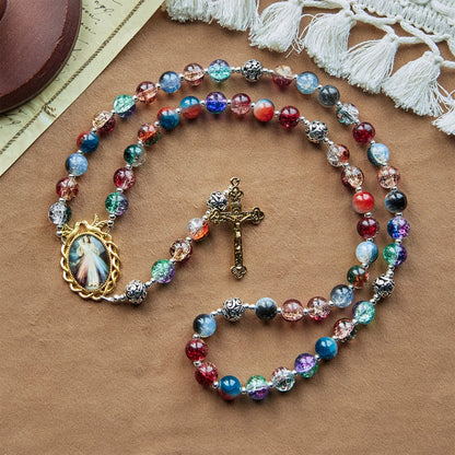 Rosario in vetro sfumato multicolore con crocifisso in ottone e medaglia della Divina Misericordia