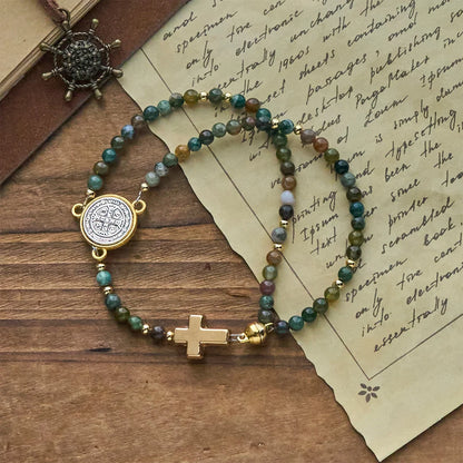 Bracciali rosario fatti a mano nei toni della terra con ciondolo a croce e di San Benedetto
