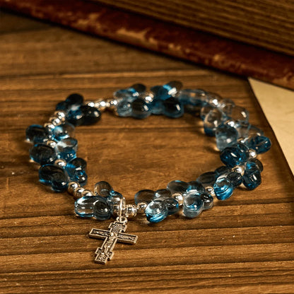 Bransoletka modlitewna z motywem zwierząt i mieniącym się niebieskim motylem Wings of Devotion