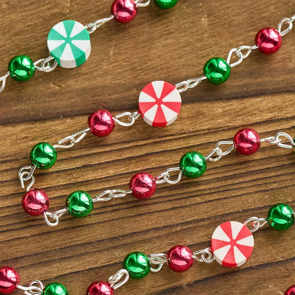 Regalo di Natale: Rosario natalizio: Perline rosse e verdi, forme a caramella e crocifisso
