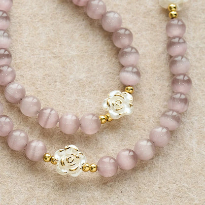 Rosario Cat's Eye & Rose color lavanda e rosa: medaglia centrale della Madonna per una preghiera dolce