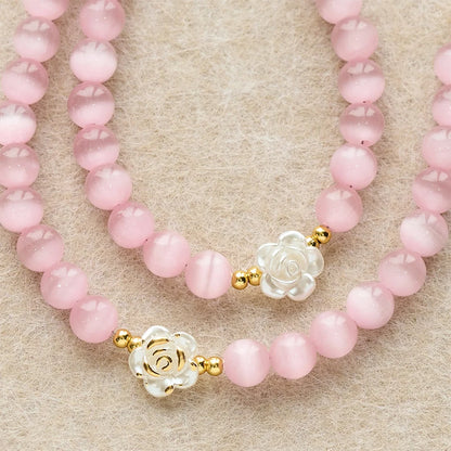 Rosario Cat's Eye & Rose color lavanda e rosa: medaglia centrale della Madonna per una preghiera dolce