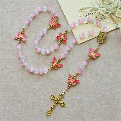 Occhio di gatto viola-rosa e vetro satinato, rosario con farfalla: incarna l'amore sacro e la grazia