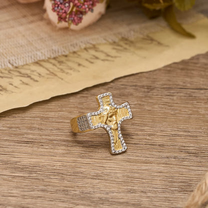 Krzyż z Twarzą Jezusa, otwarty pierścień: odważny symbol odkupieńczej łaski