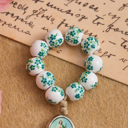 Rosario da dito in ceramica verde con motivo floreale e medaglia di San Giuda