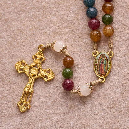Rosario in perline colorate di tormalina con immagine quadrata della Divina Misericordia e crocifisso dorato