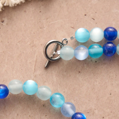 Collana rosario tricolore blu con perline opache della Madonna e chiusura a T: devozione quotidiana
