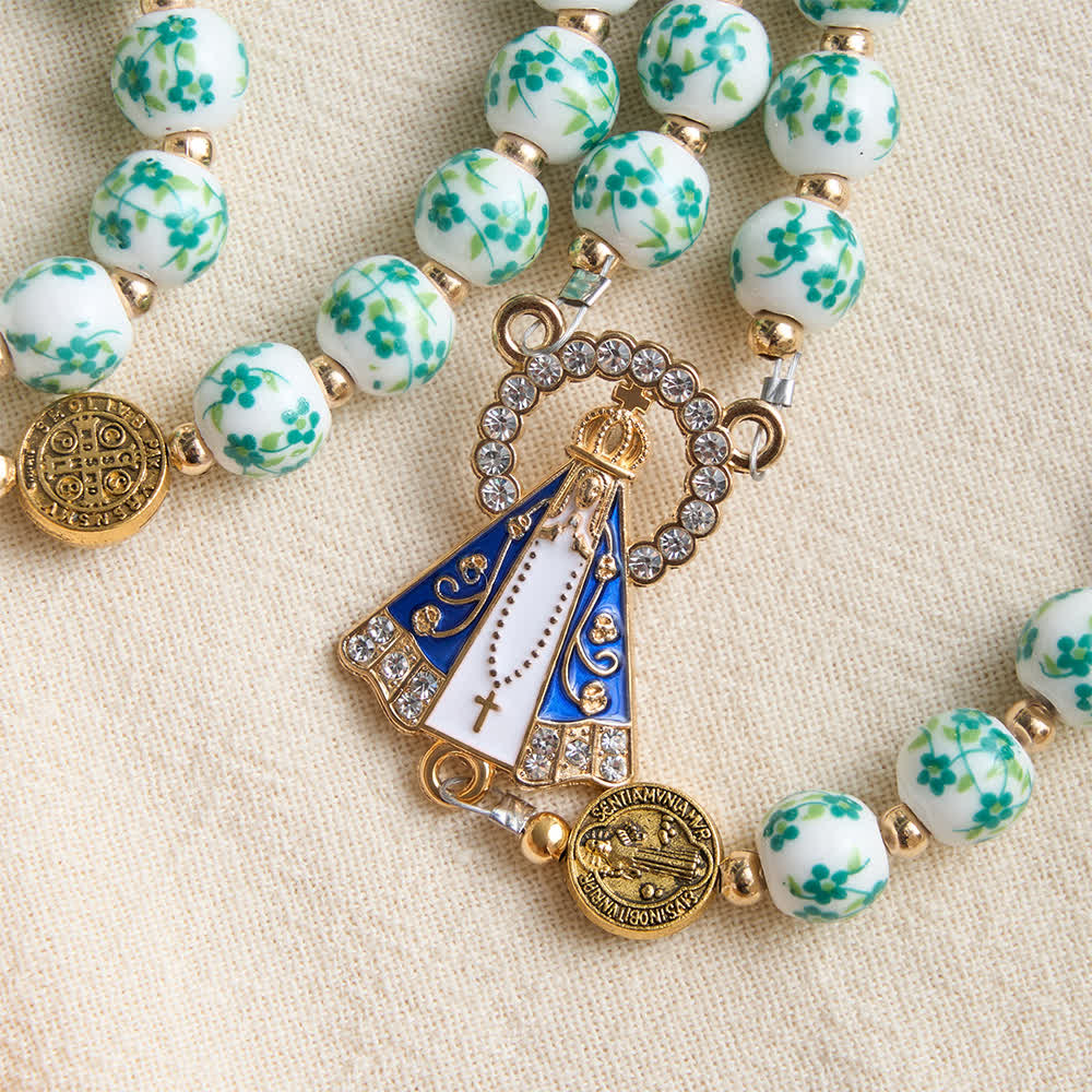 Rosario in porcellana a tre stili con stampa floreale e medaglietta della Madonna di Aparecida
