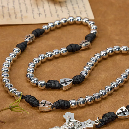 Rosario resistente in paracord con crocifisso intagliato: Totem di duratura fortificazione divina