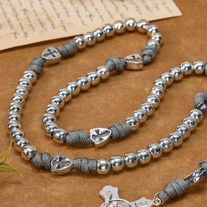 Rosario resistente in paracord con crocifisso intagliato: Totem di duratura fortificazione divina
