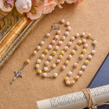 Rosario celeste con grani a forma di rosa e crocifisso: Distintivo di guida costante