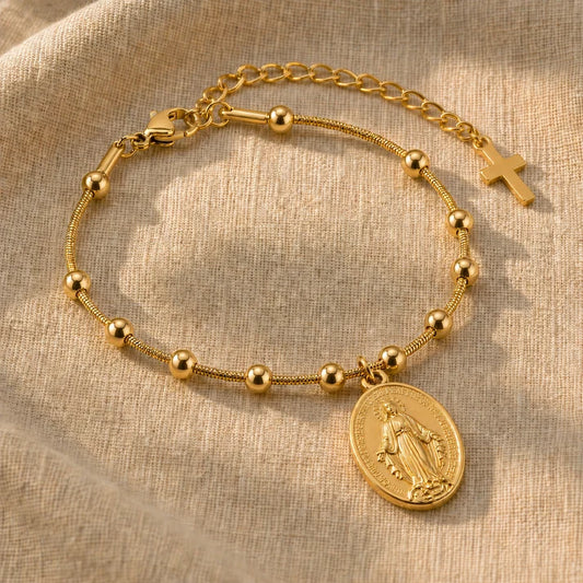 Bracciale religioso in oro